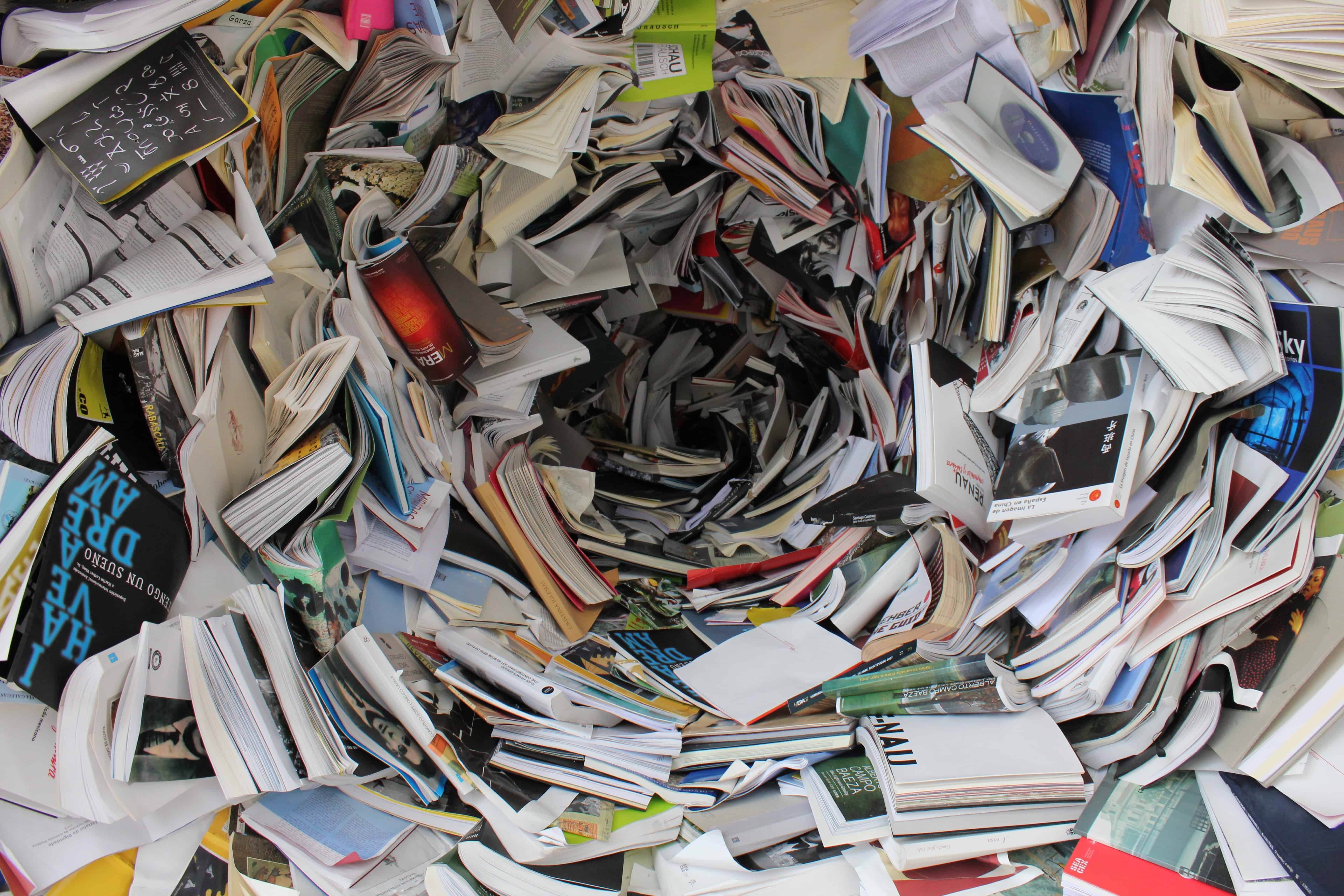 Choosing eco-friendly paper products: image of a spiral of books and paper