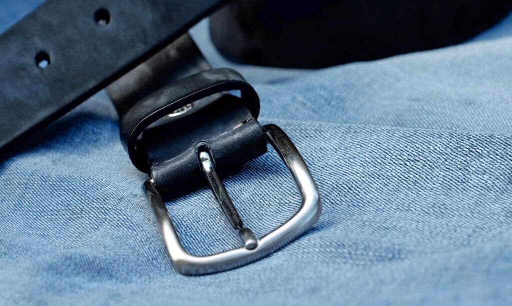 Close up of a belt buckle.