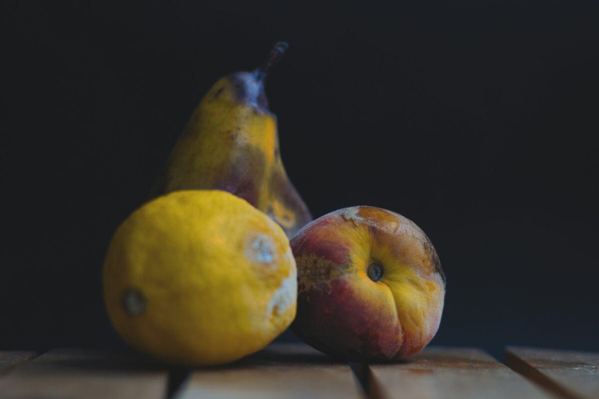 moldy peach, lemon, and pear