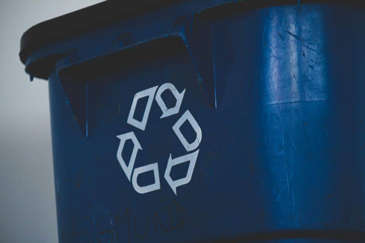 closeup of a blue recycle bin